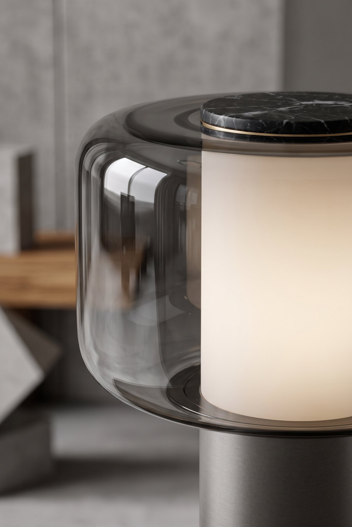 Close detail of the smoked glass shade, the glowing opal diffuser and the marble cap